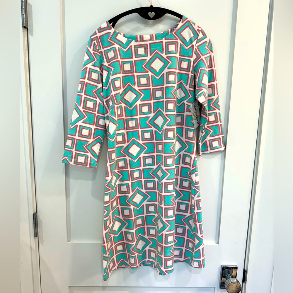 NWT Mahi gold size medium Midi dress with 3/4 sleeves. DISCONTINUED PATTERN.